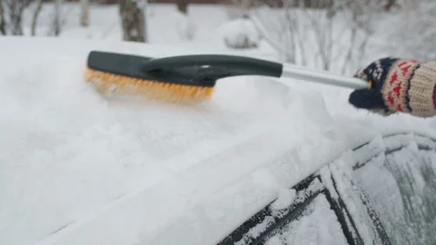 Cleaning snow from a car Stock-Footage 116763529