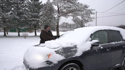 Cleaning the snow off Stock Footage 167177968