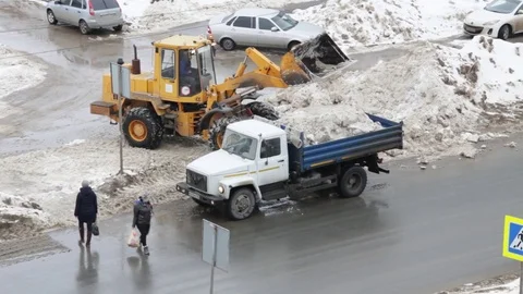 Cleaning snow from the street Stock Footage 72762269