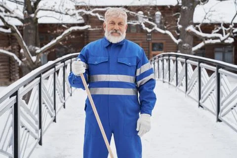 Cleaning snow in yard. Stock Photos