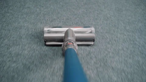 Cleaning soft carpet with vacuum cleaner. Modern housekeeping appliance 스톡 동영상 248002229