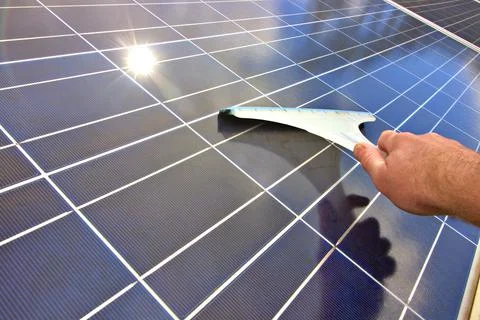 Cleaning solar panels Foto stock