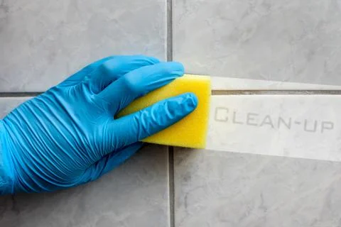 Cleaning sponge held in hand Stock Photos