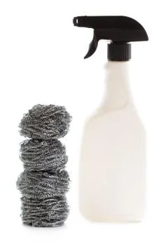 Cleaning spray bottle and scouring pads isolated Stock Photos