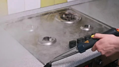 Cleaning Stove Knobs with Steam 스톡 동영상 276616951
