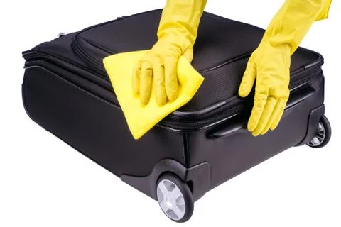 Cleaning of suitcase Foto stock