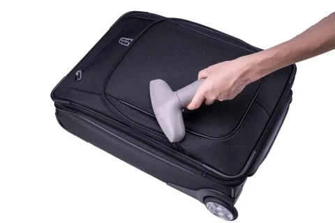 Cleaning of suitcase Foto stock