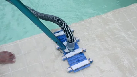 Cleaning summer pool using vacuum cleaner 動画素材 278005515