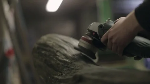 Cleaning the Surface of a Log with a Wire Brush Stock Footage 70304532