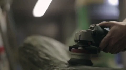 Cleaning the Surface of a Log with a Wire Brush Stock Footage 70304542