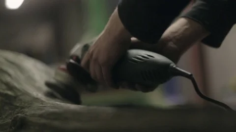 Cleaning the Surface of a Log with a Wire Brush Stock Footage 70304577