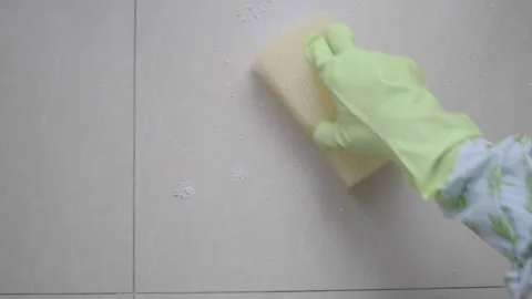 Cleaning a surface with a sponge and gloves Stock Footage 341786840