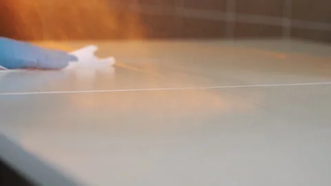 Cleaning surfaces from bacteria and viruses. Stock Footage 314339538