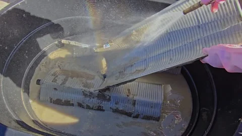 Cleaning swimming pool filter elements Stock Footage 293222299