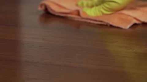 Cleaning the table from dust with wet rag close up Video stock 135826686