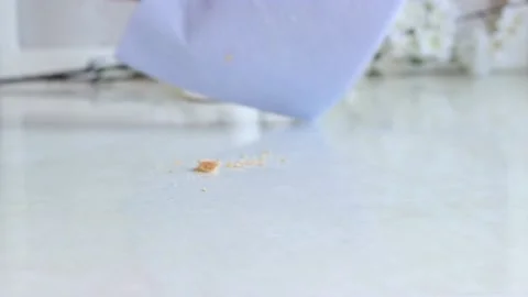 Cleaning the table surface from crumbs Stock Footage 236420290