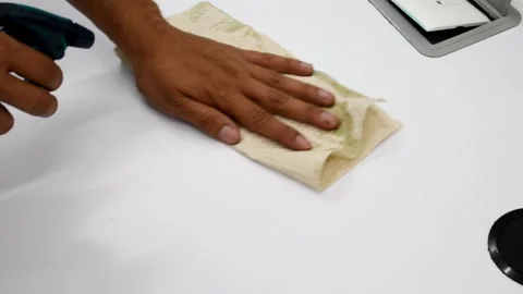 Cleaning a Table, Wiping a Surface with Cloth and Cleaner, Polishing a Desk Stock Footage 300600346