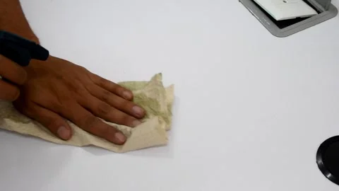 Cleaning a Table, Wiping a Surface with Cloth and Cleaner, Polishing a Desk Stock Footage 300600381
