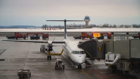 Cleaning the tarmac with airplane preparing for flight Stock Footage 87170664