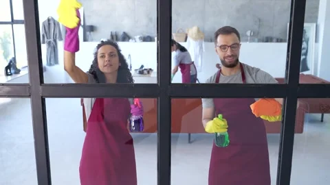 Cleaning team offering quality window cleaning Stock Footage 279492829
