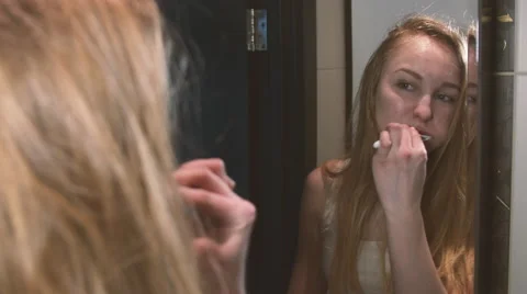 Cleaning teeth Stock Footage 61878807