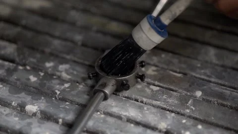 Cleaning a tool with a tool cleaning machine Stock Footage 203855791