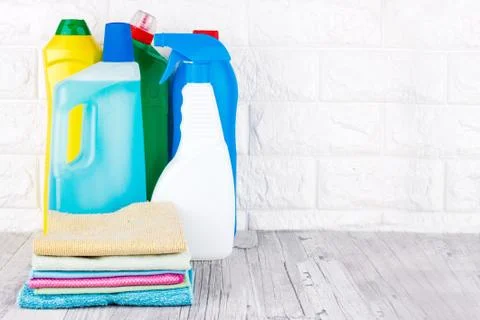 Cleaning tools - liquid, paste, gel in plastic containers. Brush, sponge, mic Stock Photos
