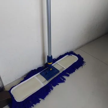Cleaning tools for sweeping or mopping floors Stock Photos