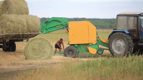 CLEANING THE TRACTOR AFTER WORK Stock Footage 158125042