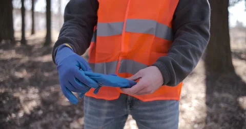 Cleaning trash in the forest, ecoactivist Stock Footage 172337128