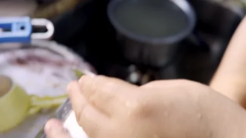Cleaning of Utensils in Kitchen Stock Footage 333609028