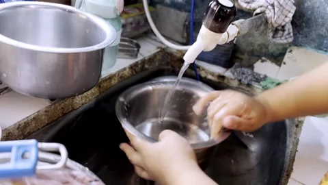 Cleaning of Utensils in Kitchen Stock Footage 333609040
