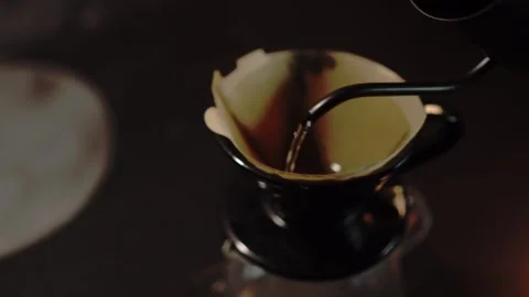 Cleaning V60 Filter Paper with Hot Water Before Brewing Coffee. Barista rin.. Stock Footage 306294580