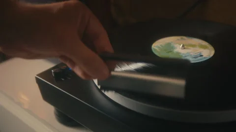 Cleaning the vinyl record Stock Footage 288353438