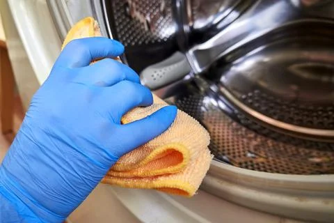 Cleaning the washing machine Stock Photos