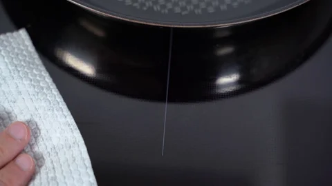Cleaning with a white napkin Stock Footage 130010424