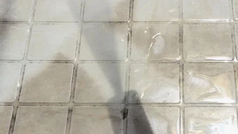 Cleaning a white plastic garden table with a high pressure water gun 스톡 동영상 149763460