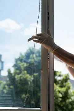 Cleaning a window Stock Photos