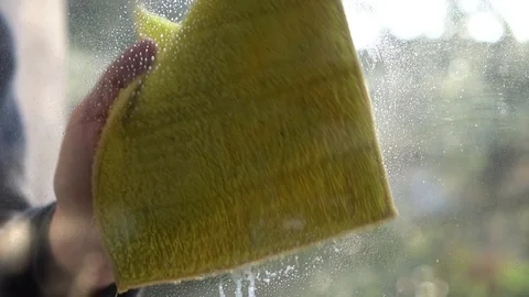 Cleaning the Window with a Sponge Video stock 122108871