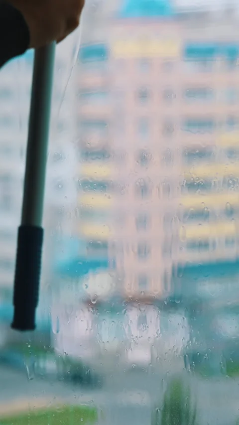 Cleaning window with squeegee Stock-Footage 303135214