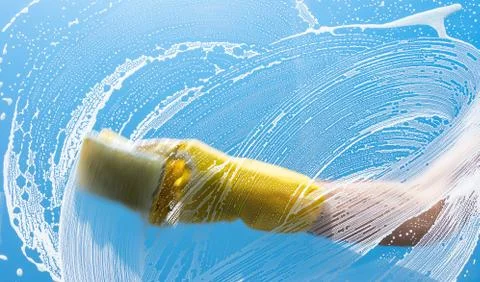 Cleaning windows with special rag Stock-Fotos