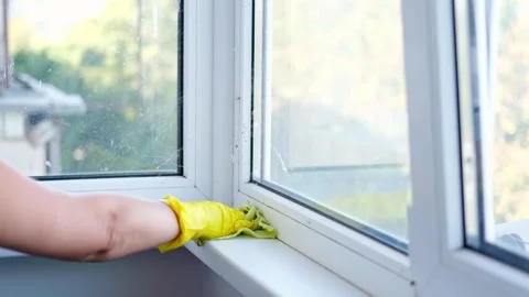 Cleaning the windowsill wiping dust by microfiber cloth for cleaning Video stock 255924869