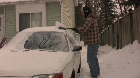 Cleaning Off Winter Stock Footage