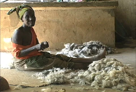 Cleaning wool Mali Stock Footage 273874