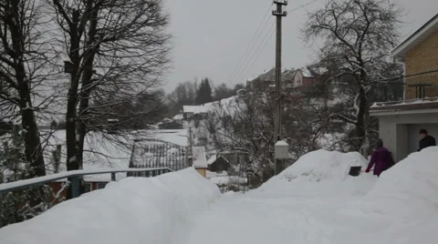 Cleaning yard after snow storm 3 Stock Footage 1015764