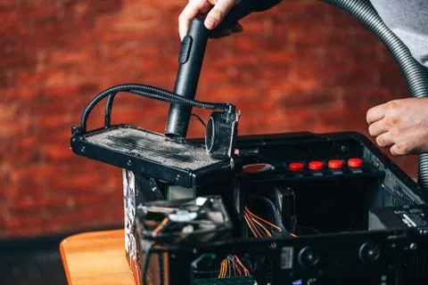 Cleaning your computer from dust and dirt. Stock Photos