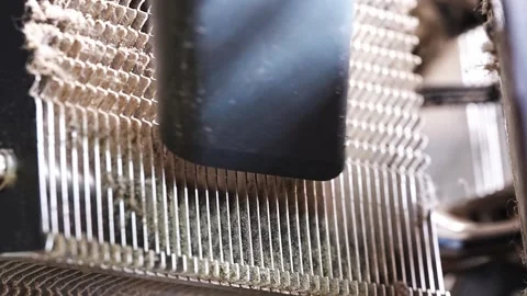 Cleaning your computer radiator to improve performance and cooling 動画素材 304520301