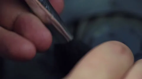 Cleans dust in cooler system with yellow brush Video stock 205906885