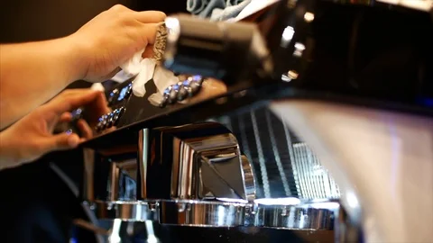 Cleans favorite professional coffee machine. Professional clean equipment. Stock Stock Footage 89590908