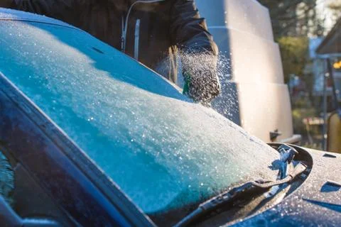Cleans frozen windshield 写真素材